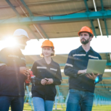 Technician using field service management software to meet customer expectations