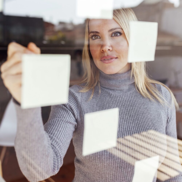 Business woman reviewing financial dashboards in NetSuite ERP after implementation.