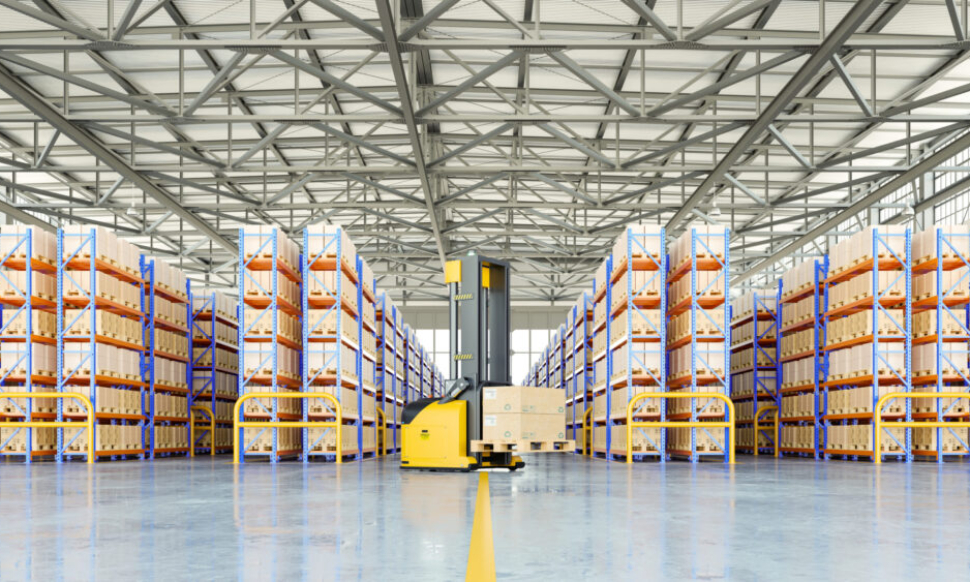 Modern warehouse with automated forklift and organised shelving, representing an advanced warehouse management system in Ireland for wholesale distributors.