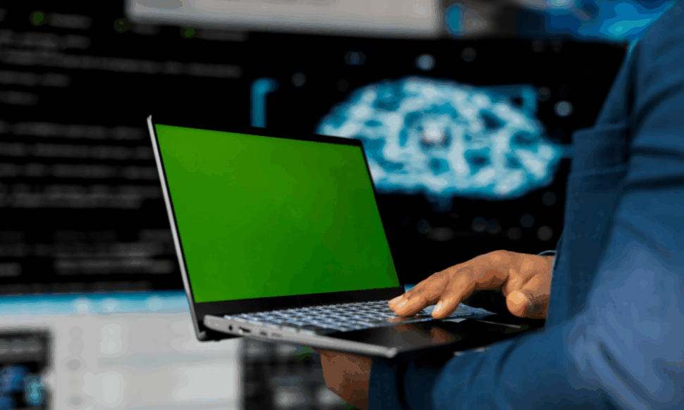 Young engineer working on software while reviewing cloud ERP migration plans