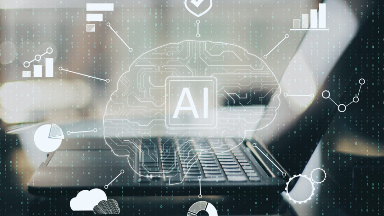Close-up of laptop with creative AI brain circuits showing NetSuite ERP embedded intelligence