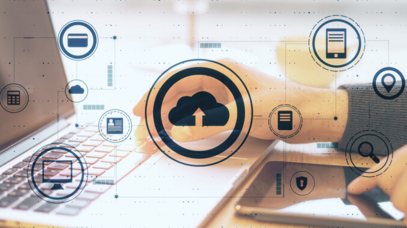 Cloud computing concept with laptop and tablet showing cloud ERP software dashboard for growing small businesses