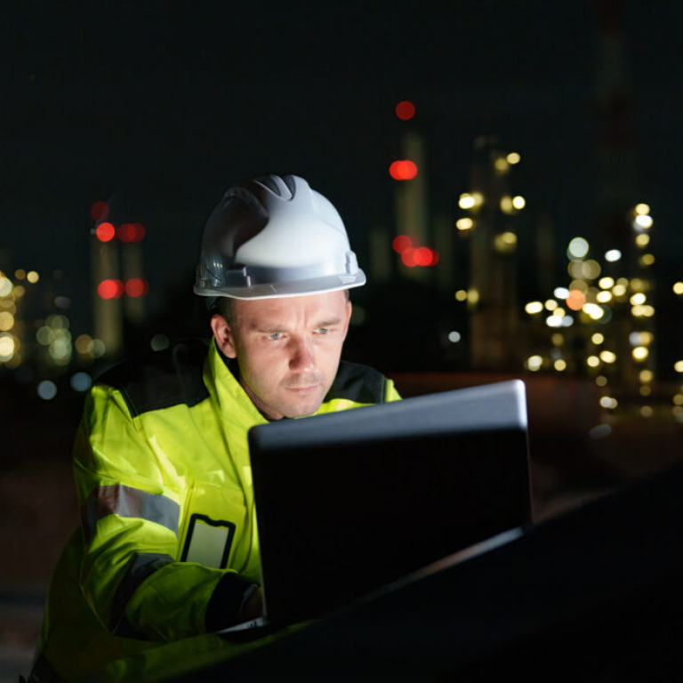 Field service technician using field service management software on a tablet